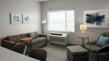 Suite, 1 Double Bed | Living room | 42-inch Smart TV with cable channels, TV, Netflix
