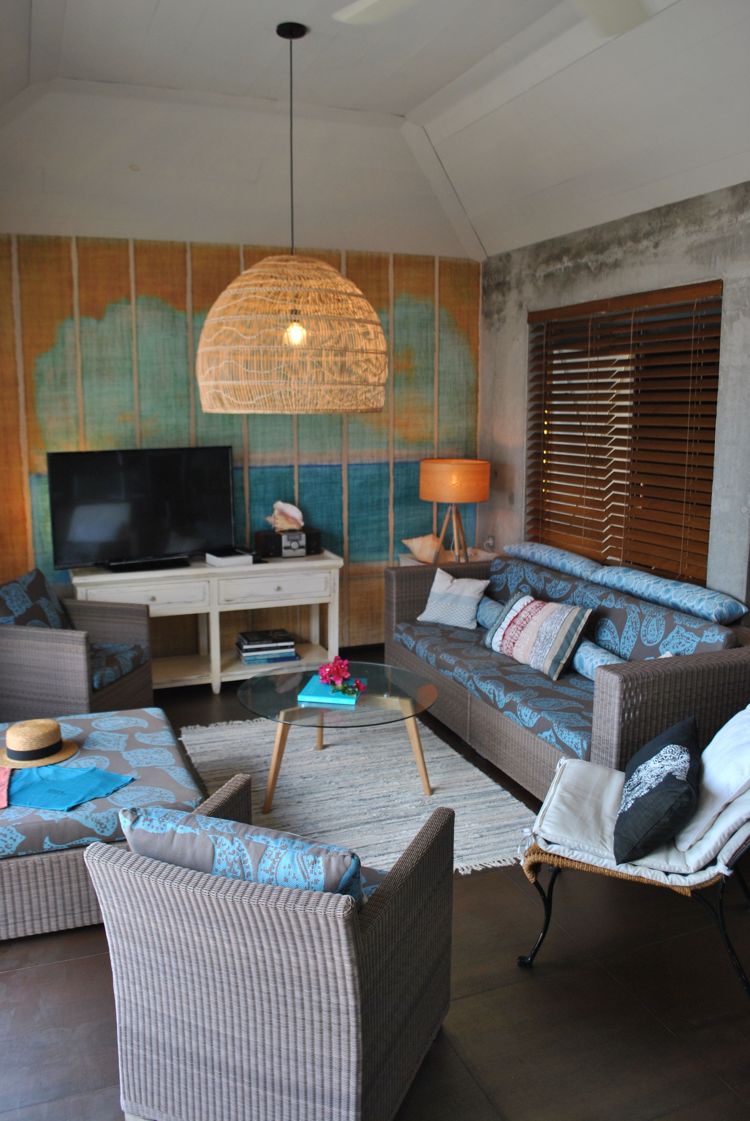 panoramic suite, 1 bedroom, private pool, ocean view | living area | flat-screen tv