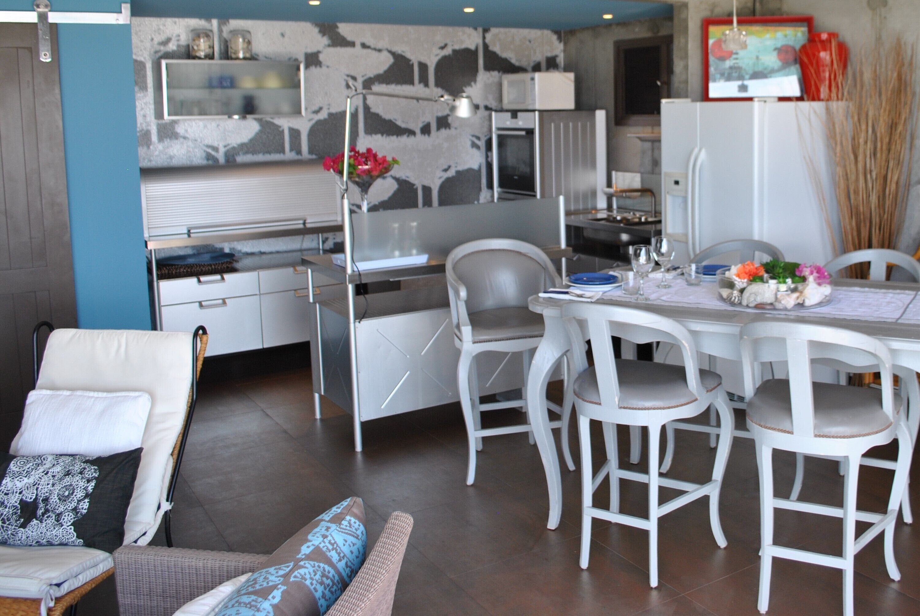 panoramic suite, 2 bedrooms, private pool, ocean view | living area | flat-screen tv