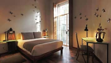 Junior Suite | 1 bedroom, premium bedding, in-room safe, individually decorated