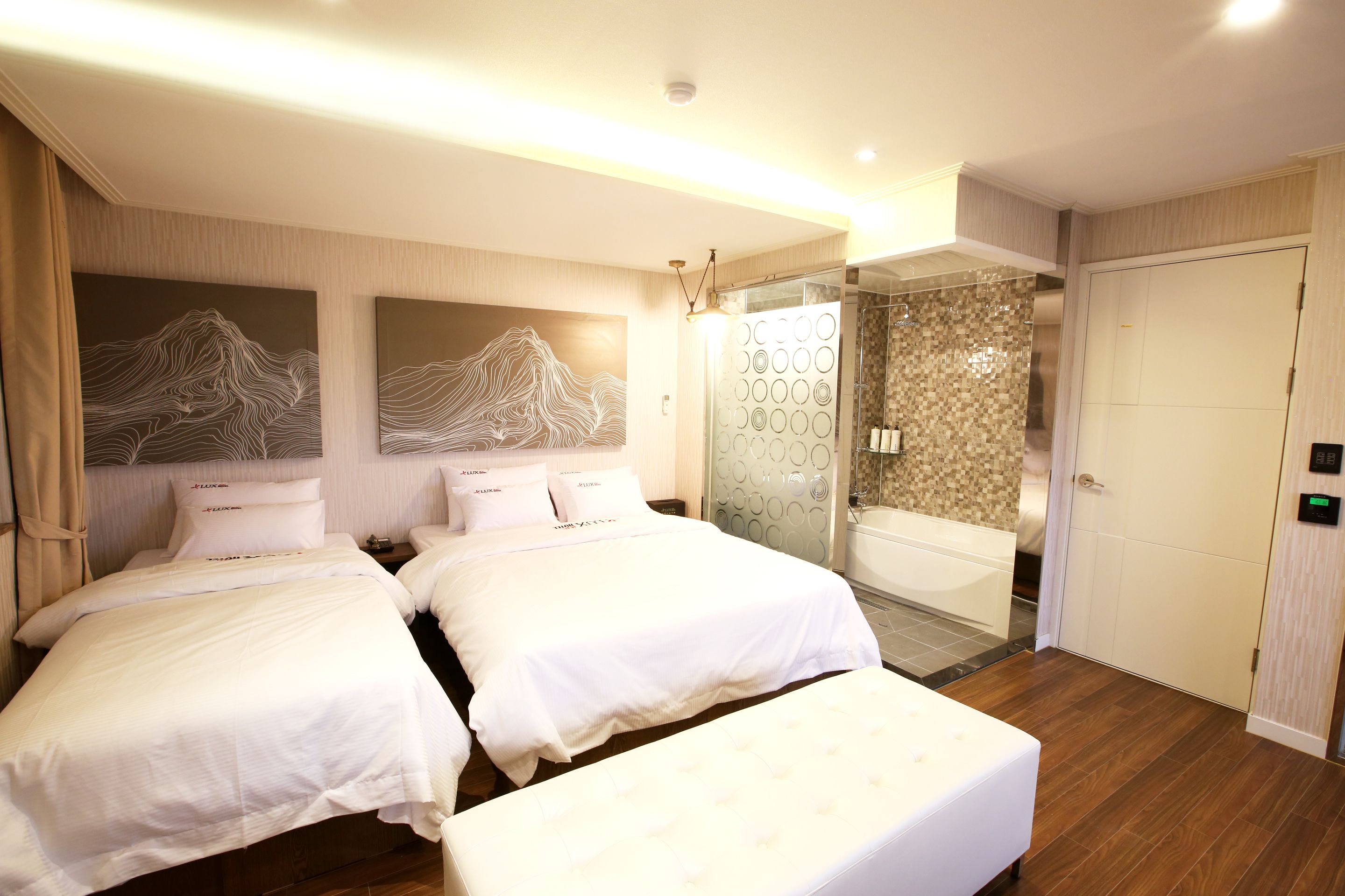 Luxury Twin Room | Down comforters, memory foam beds, individually decorated