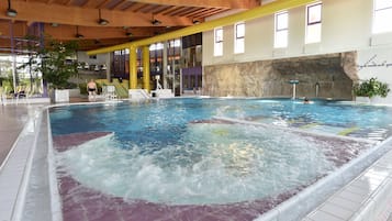 Relax by the pool surrounded by a tranquil atmosphere and stunning architecture.