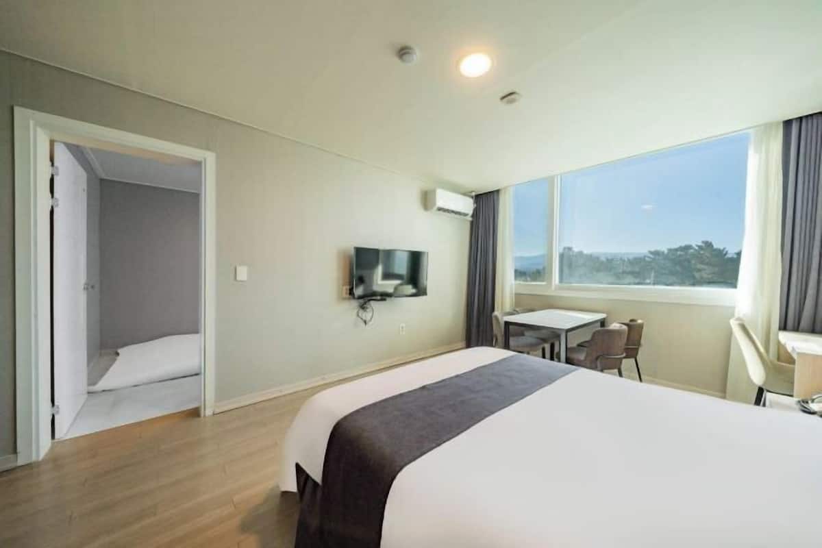 Desk, laptop workspace, blackout curtains, soundproofing