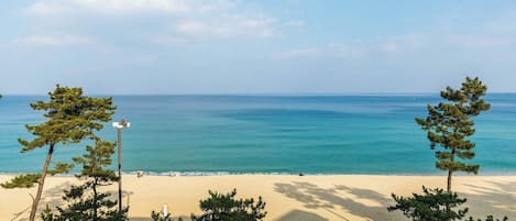 Family Quadruple Room, Ocean View | Desk, laptop workspace, blackout drapes, soundproofing