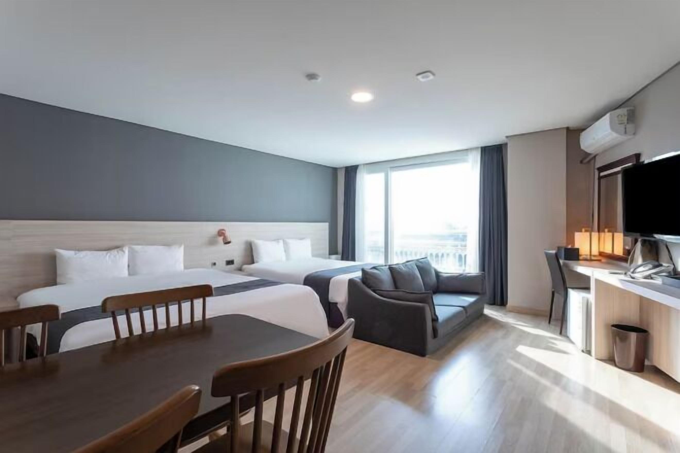 Desk, laptop workspace, blackout drapes, soundproofing