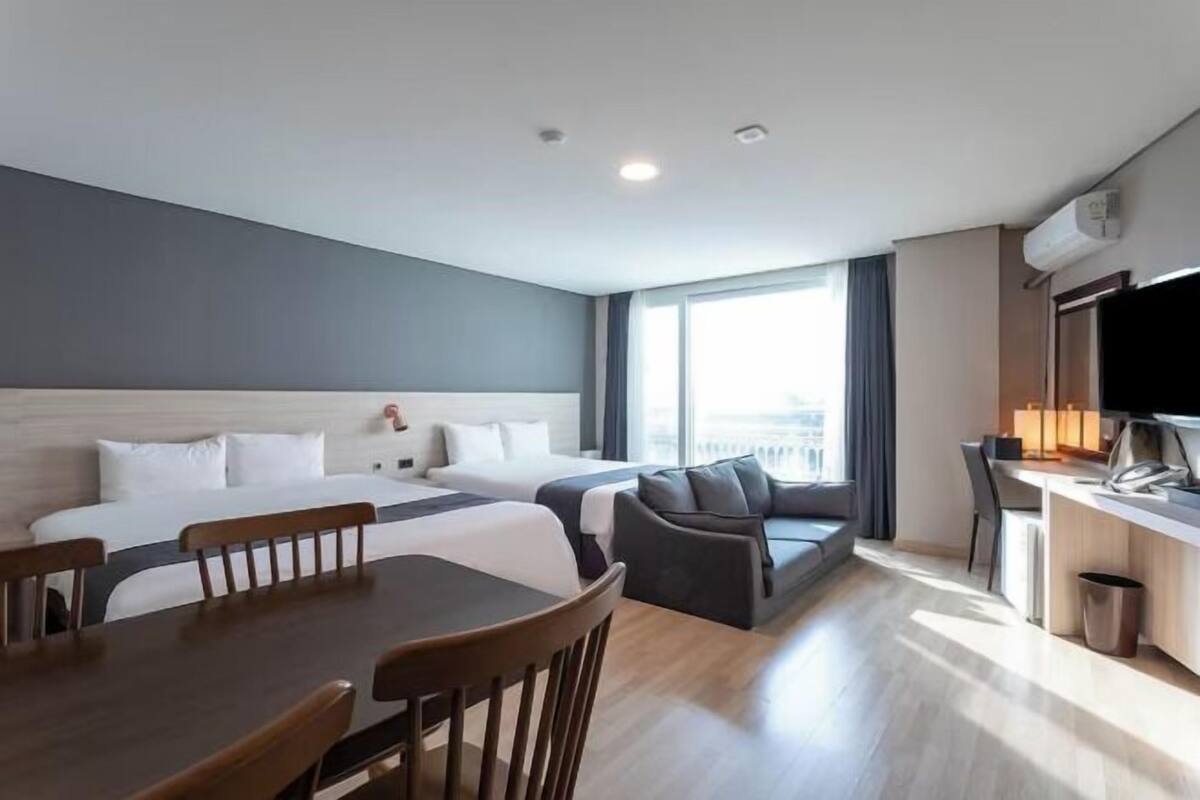 Desk, laptop workspace, blackout drapes, soundproofing