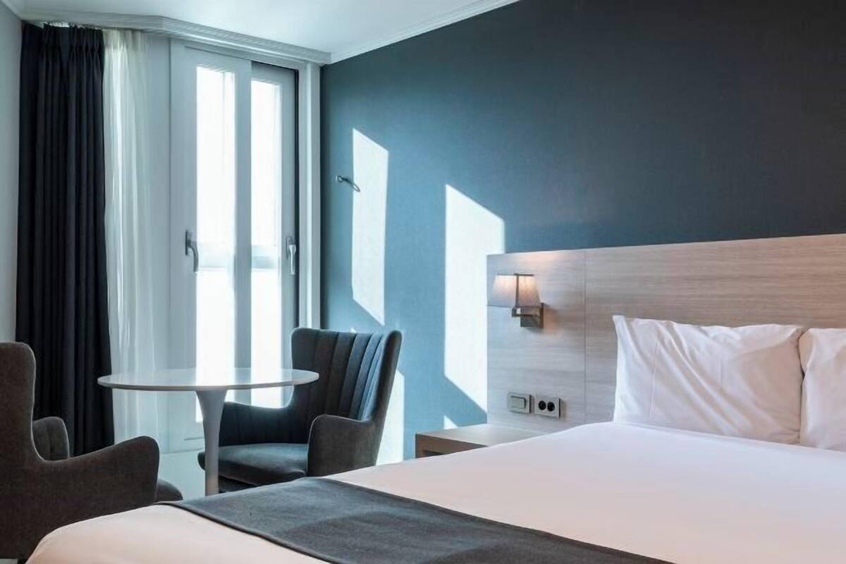 Desk, laptop workspace, blackout drapes, soundproofing