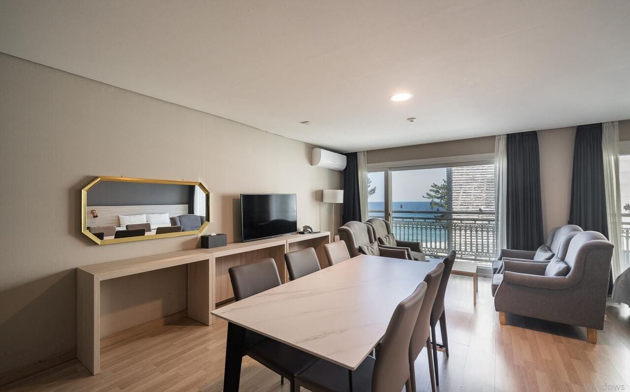 Family Quadruple Room, Partial Sea View | Desk, laptop workspace, blackout drapes, soundproofing