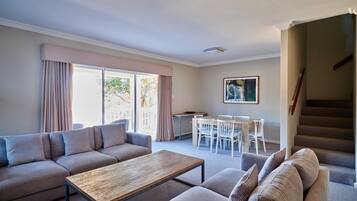 Villa, 3 Bedrooms (Self Contained) | Living area | 65-inch Smart TV with digital channels, Netflix, streaming services