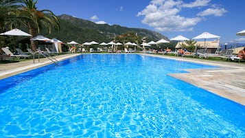 Seasonal outdoor pool, open 9:00 AM to 8:00 PM, free cabanas
