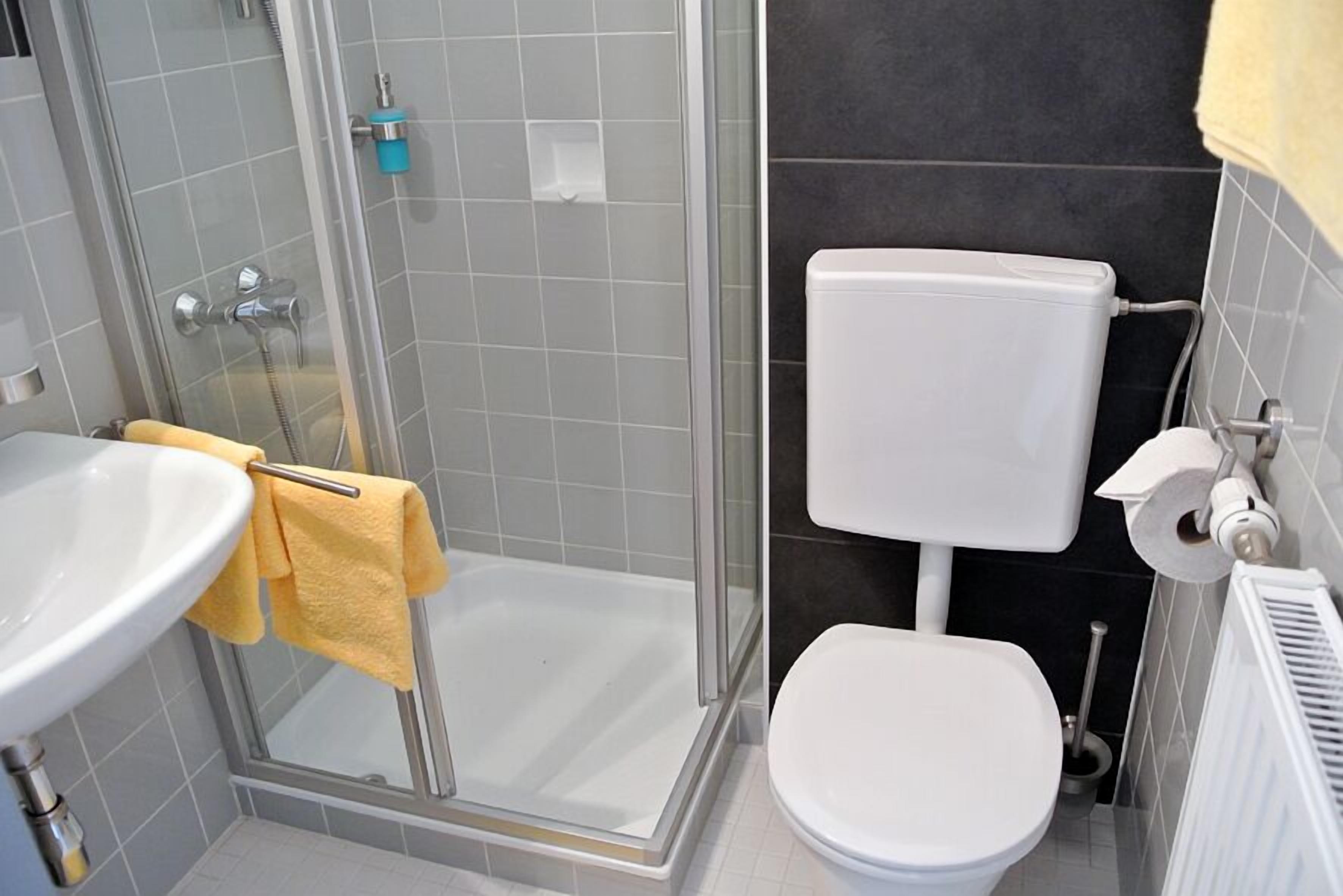 deep-soaking bathtub, free toiletries, hair dryer, towels