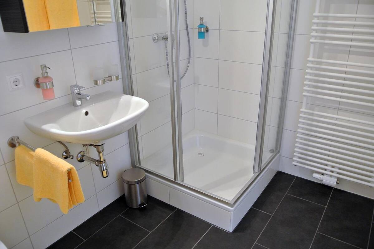 deep-soaking bathtub, free toiletries, hair dryer, towels