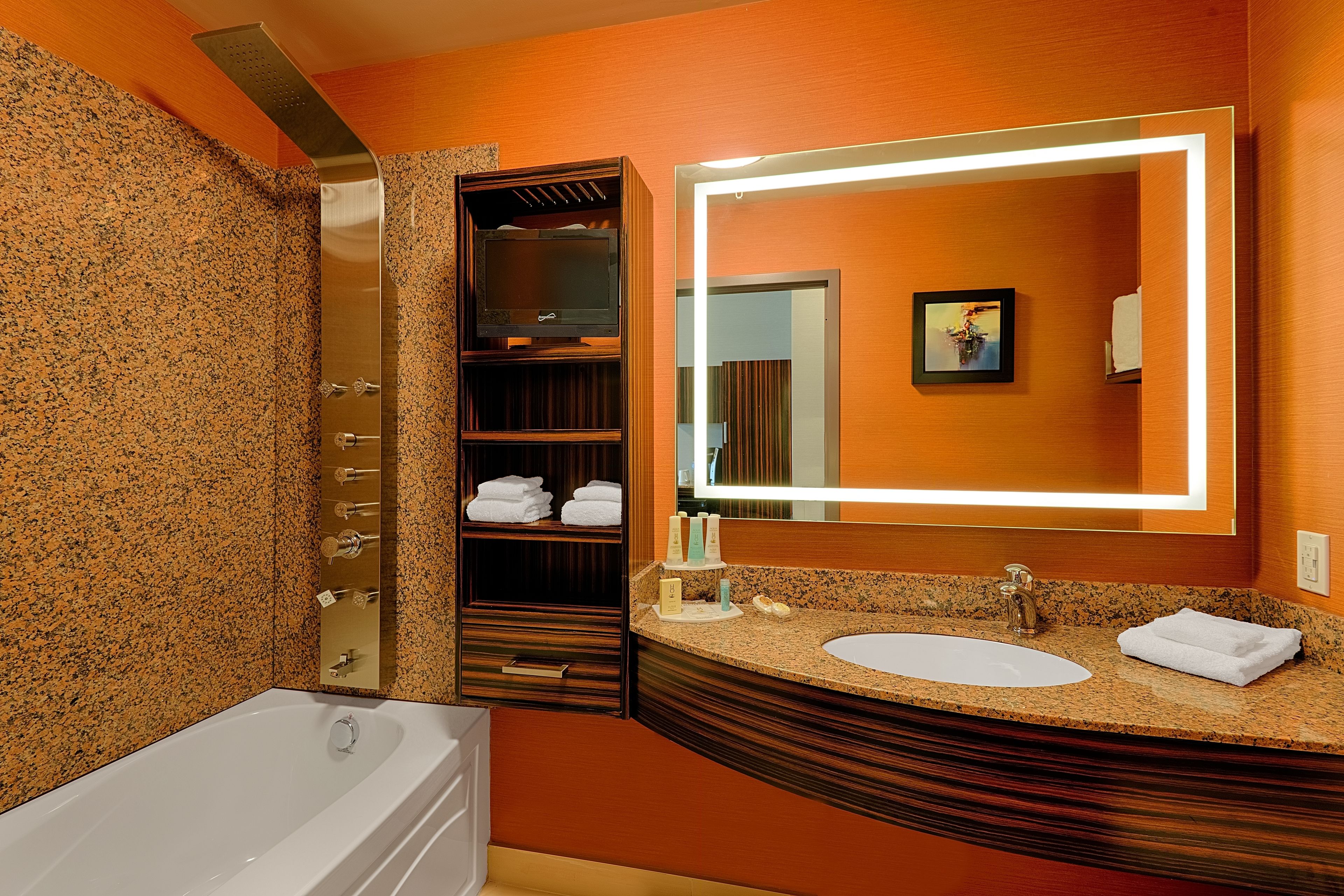 combined shower/bathtub, deep-soaking bathtub, rainfall showerhead