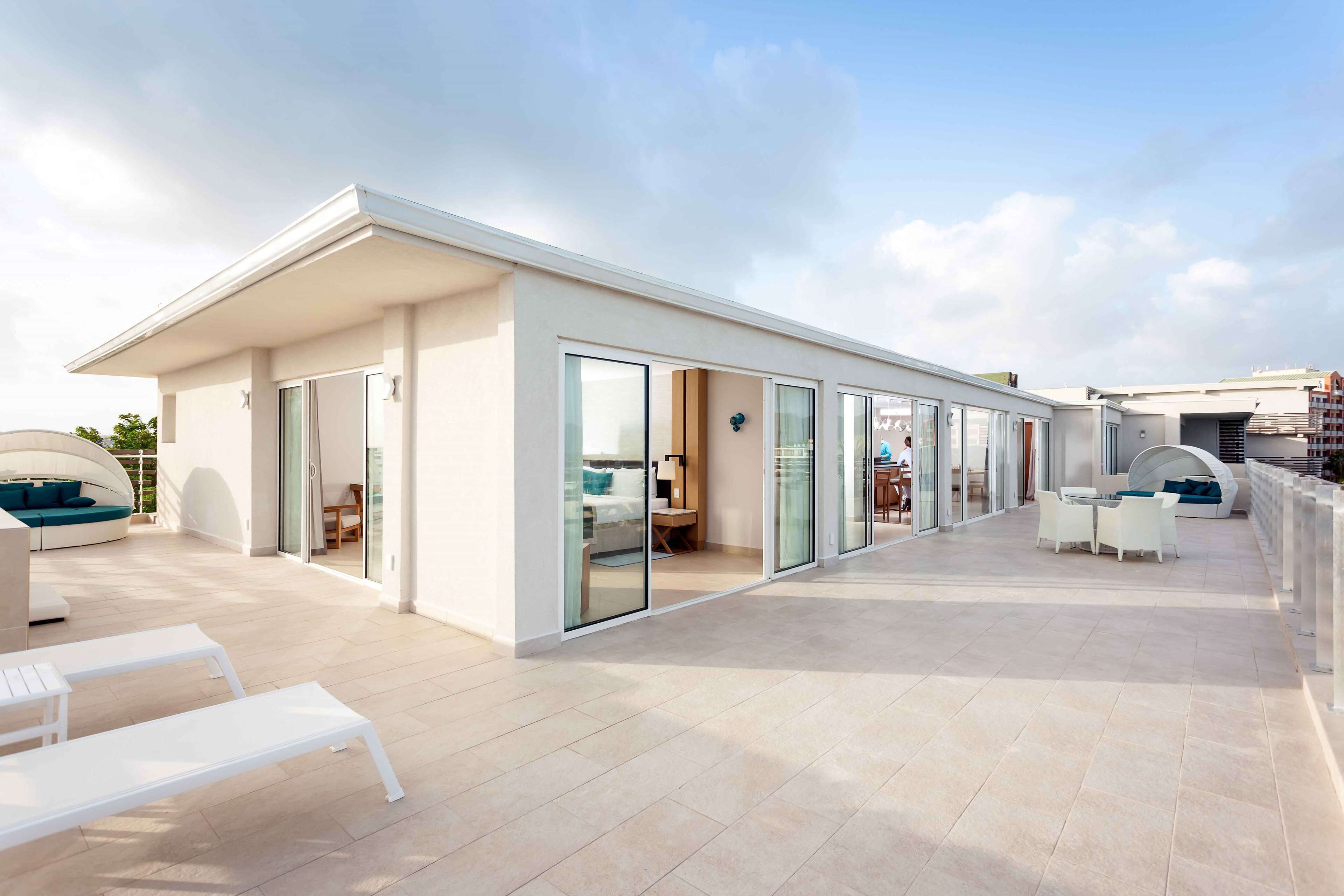 Suite Exécutive, 1 très grand lit, vue océan (Luxury Butler Penthouse) | Literie de qualité supérieure, articles gratuits dans le mini-bar