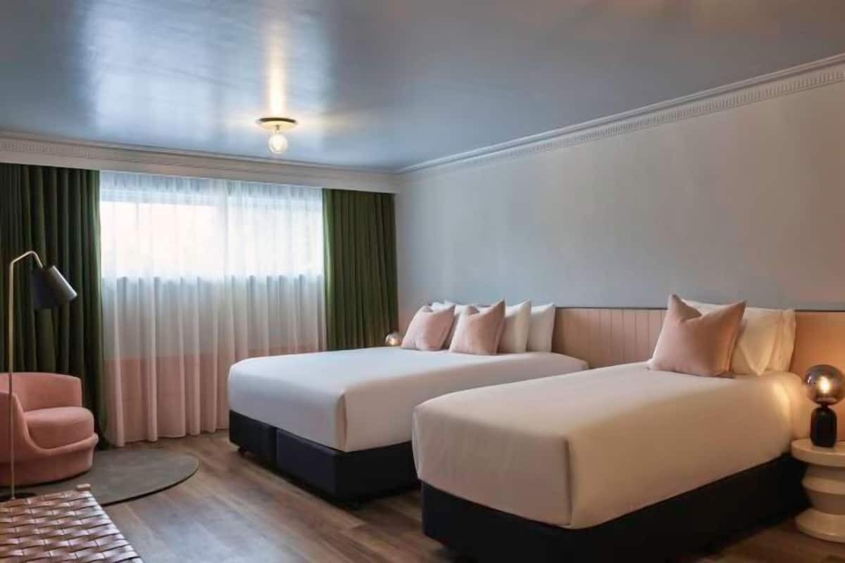 Premium bedding, blackout drapes, iron/ironing board, free WiFi