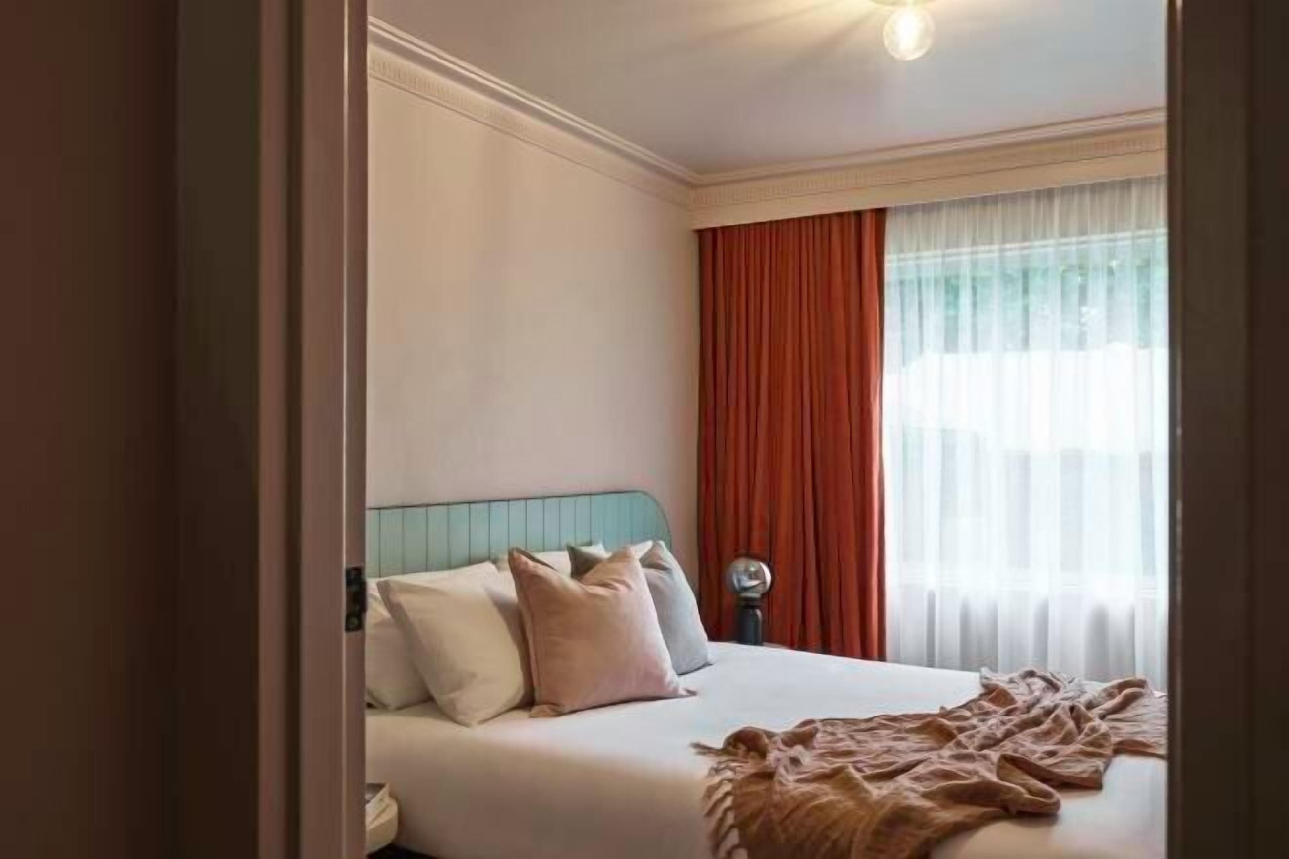 Premium bedding, blackout curtains, iron/ironing board, free WiFi