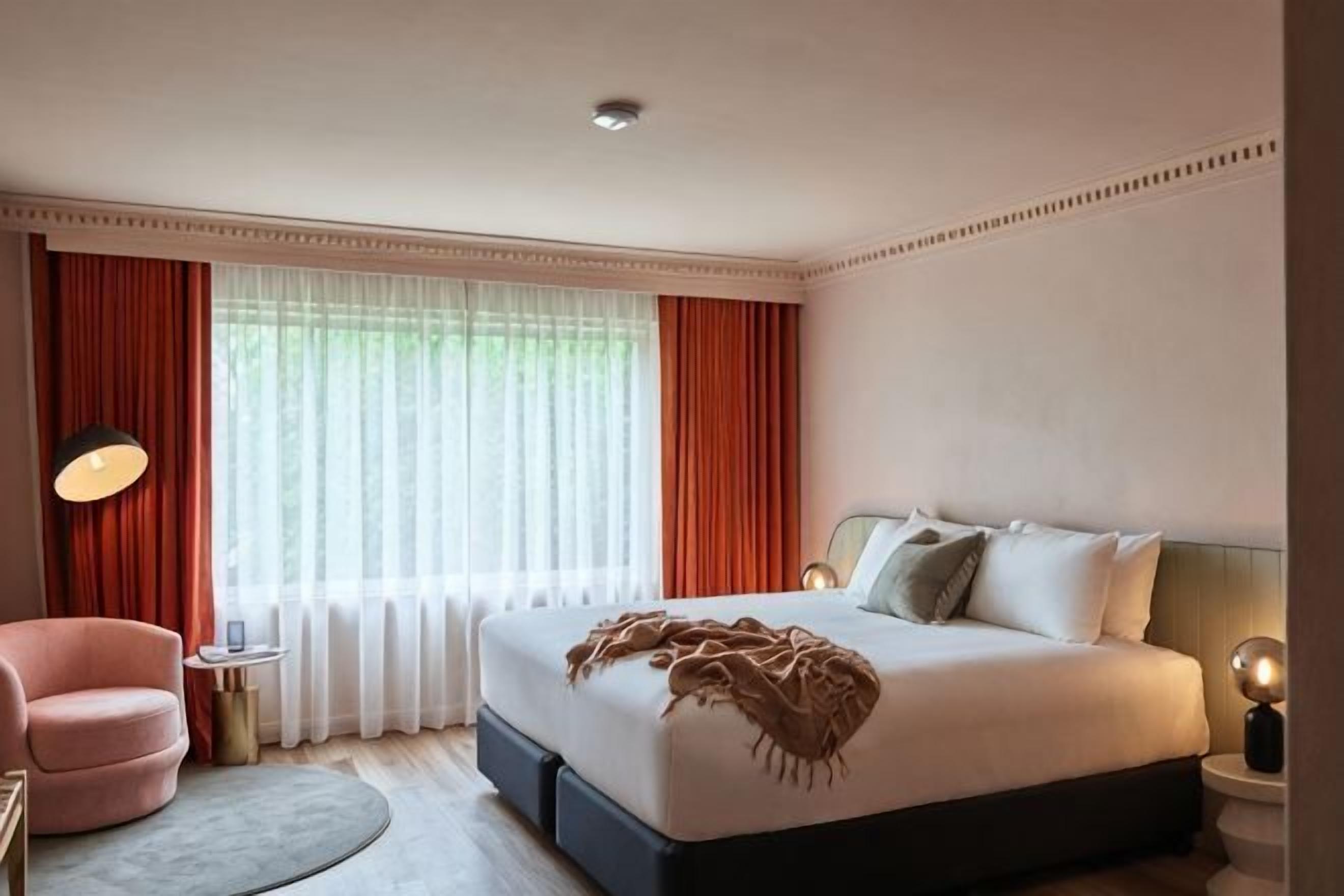 Premium bedding, blackout drapes, iron/ironing board, free WiFi