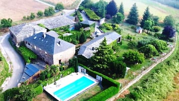 Seasonal outdoor pool, open noon to 2:00 PM, pool umbrellas