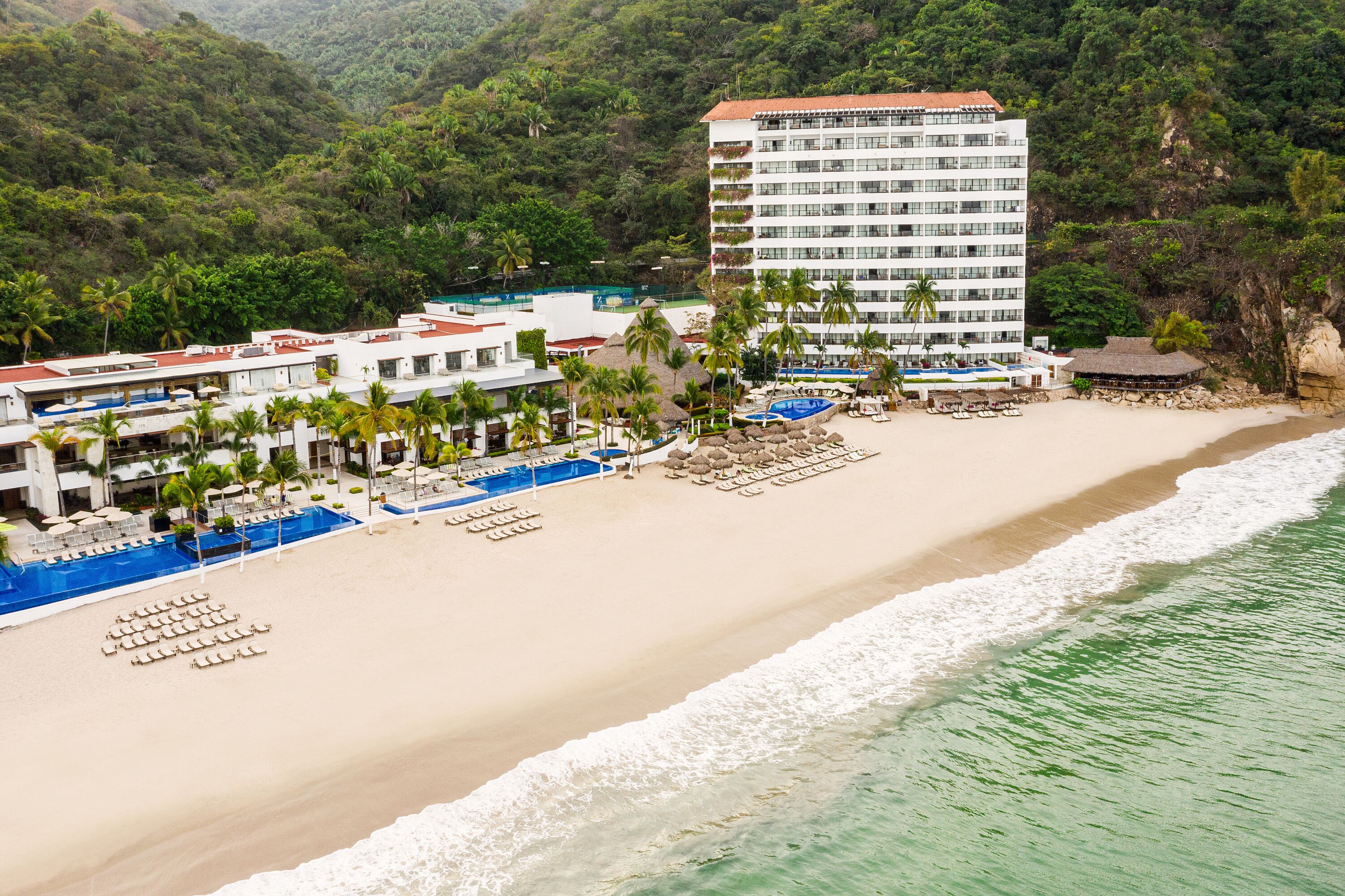 On the beach, beach cabanas, sun loungers, beach umbrellas