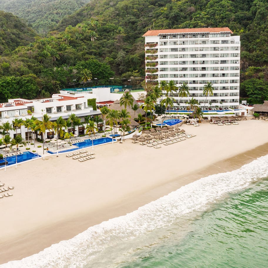 On the beach, beach cabanas, sun loungers, beach umbrellas