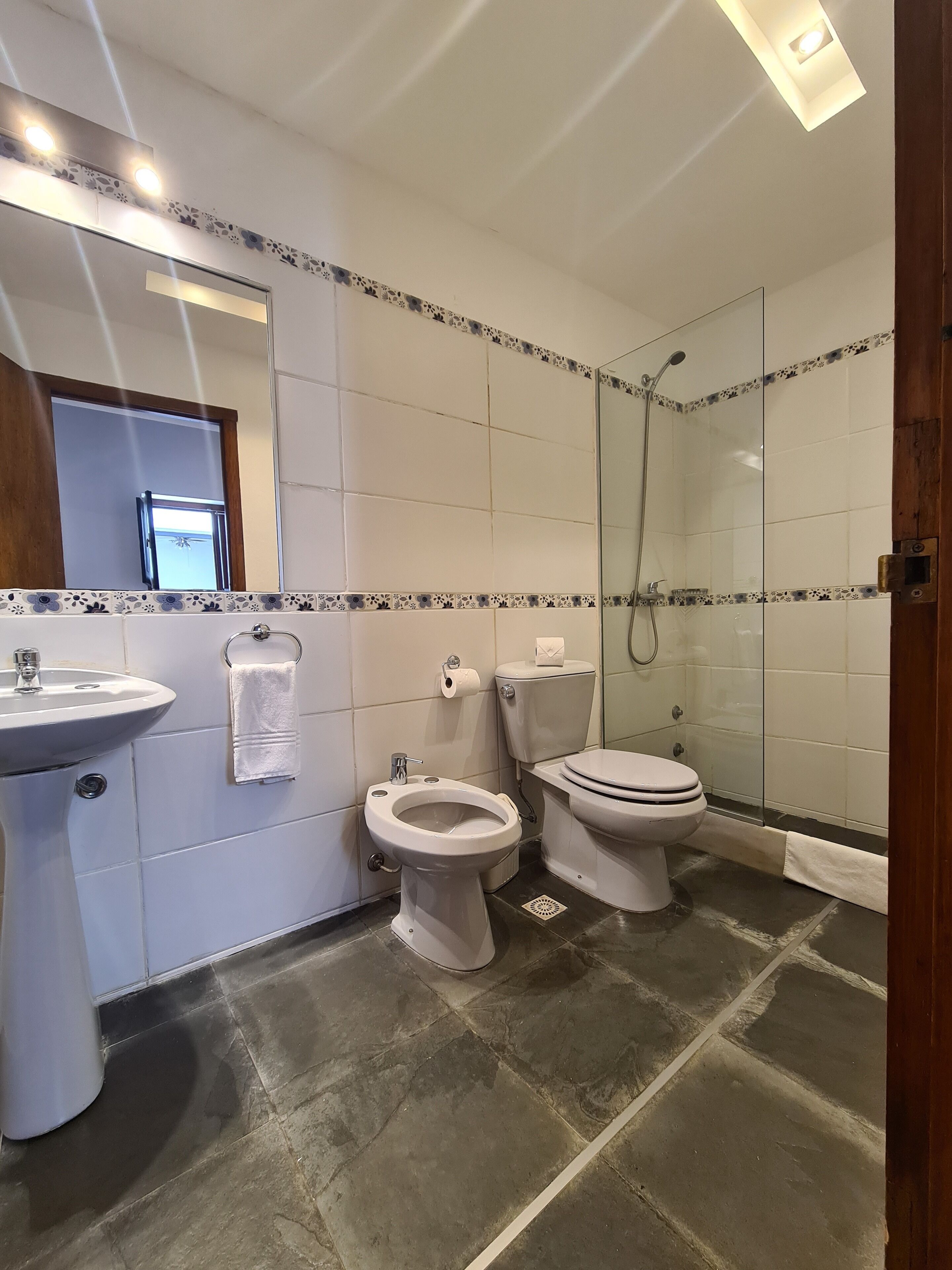 superior triple room | bathroom | shower, free toiletries, hair dryer, towels