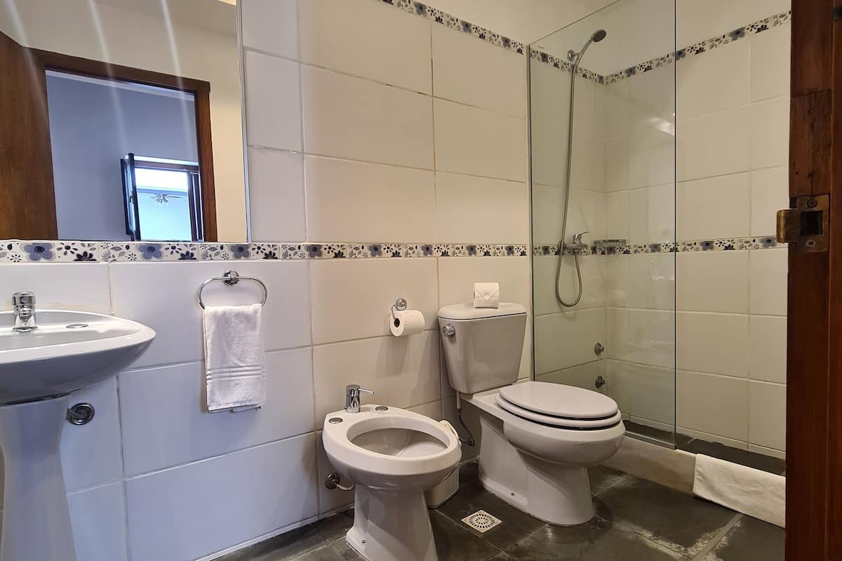 superior triple room | bathroom | shower, free toiletries, hair dryer, towels