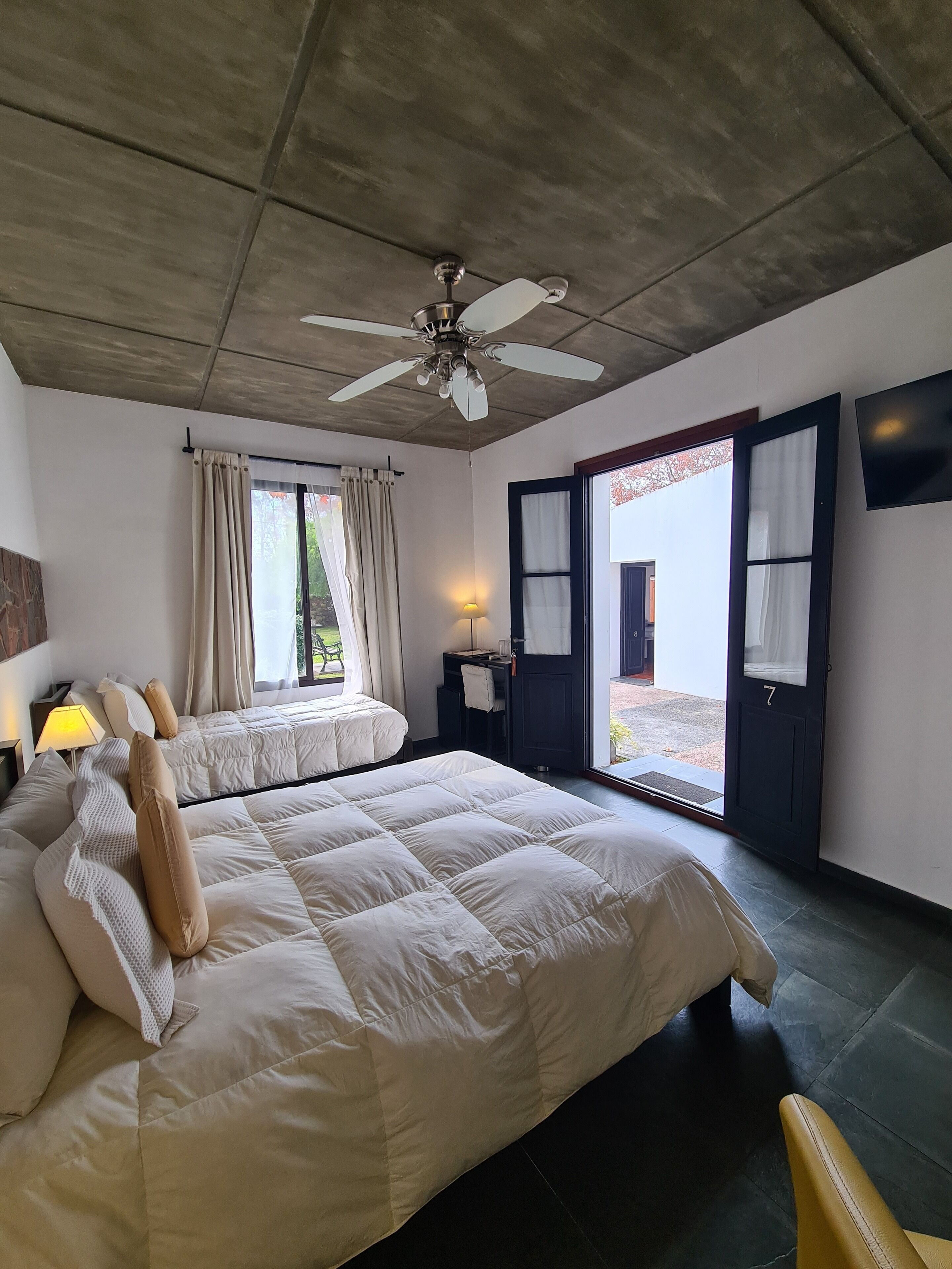 Superior Triple Room | Minibar, in-room safe, desk, soundproofing