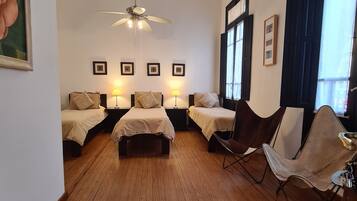 Superior Triple Room | Minibar, in-room safe, desk, soundproofing