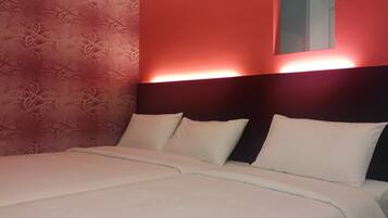 Premium bedding, desk, iron/ironing board, rollaway beds