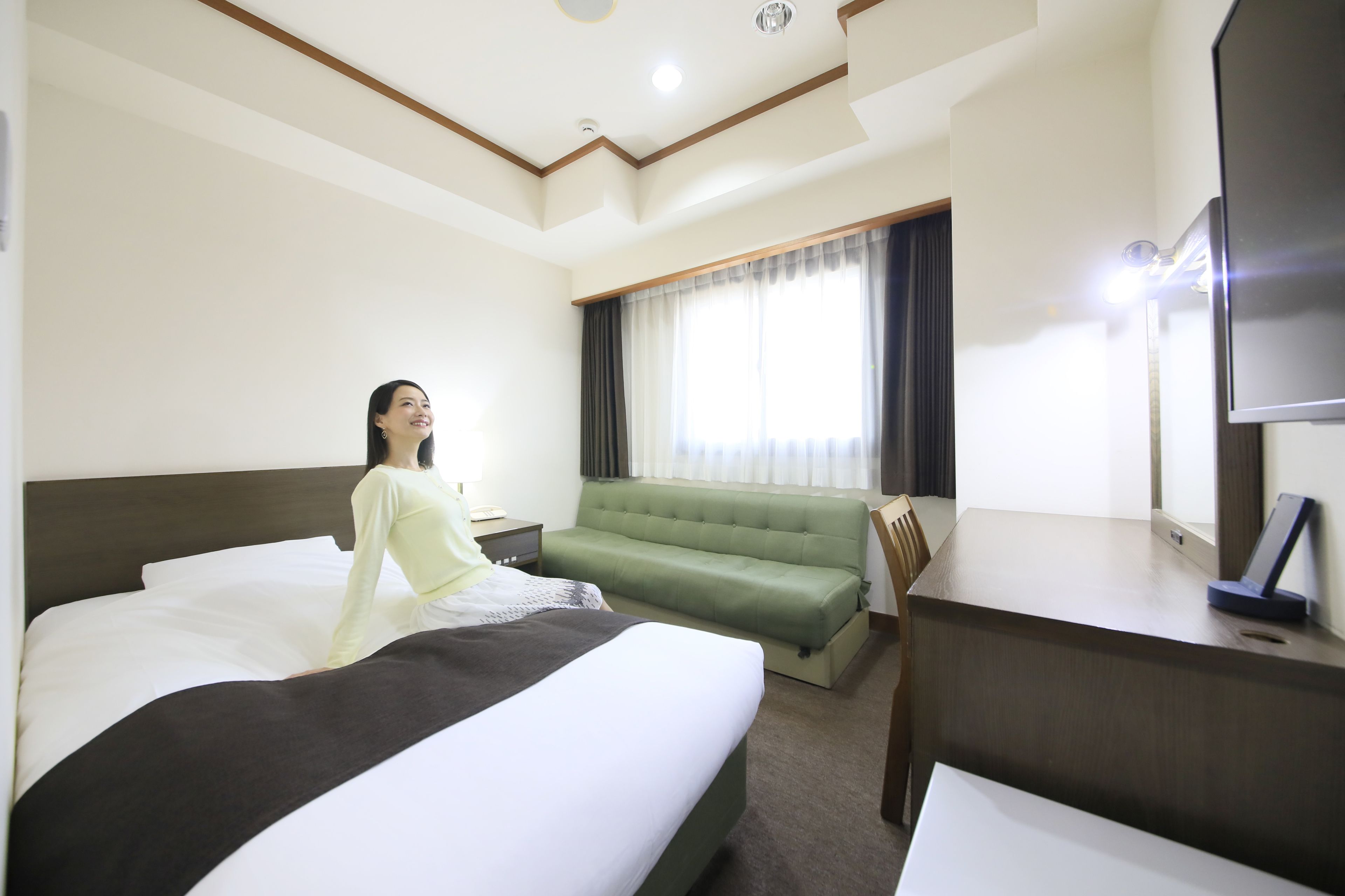 Down comforters, desk, blackout drapes, iron/ironing board