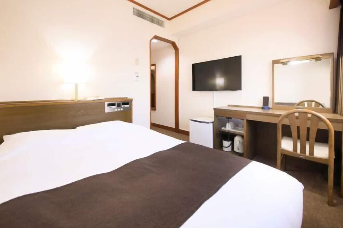 Down duvets, desk, blackout curtains, iron/ironing board