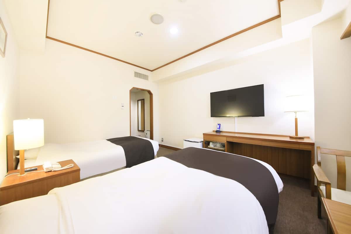 Down duvets, desk, blackout curtains, iron/ironing board