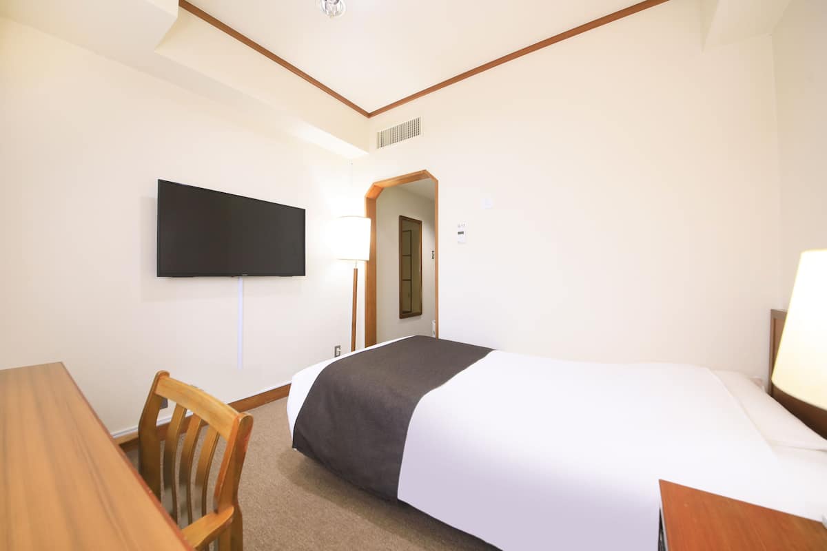 Down duvets, desk, blackout curtains, iron/ironing board