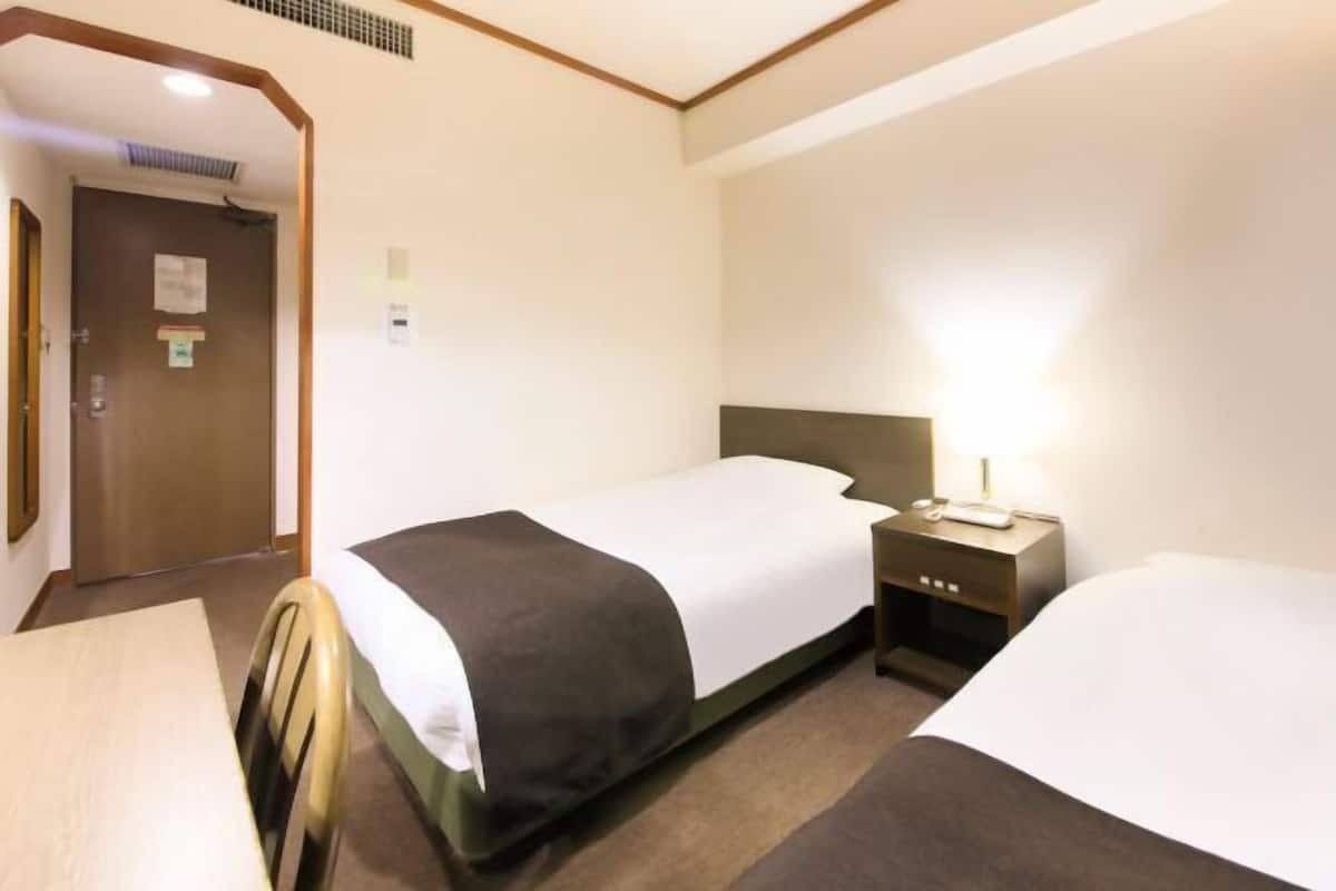 Down duvets, desk, blackout curtains, iron/ironing board