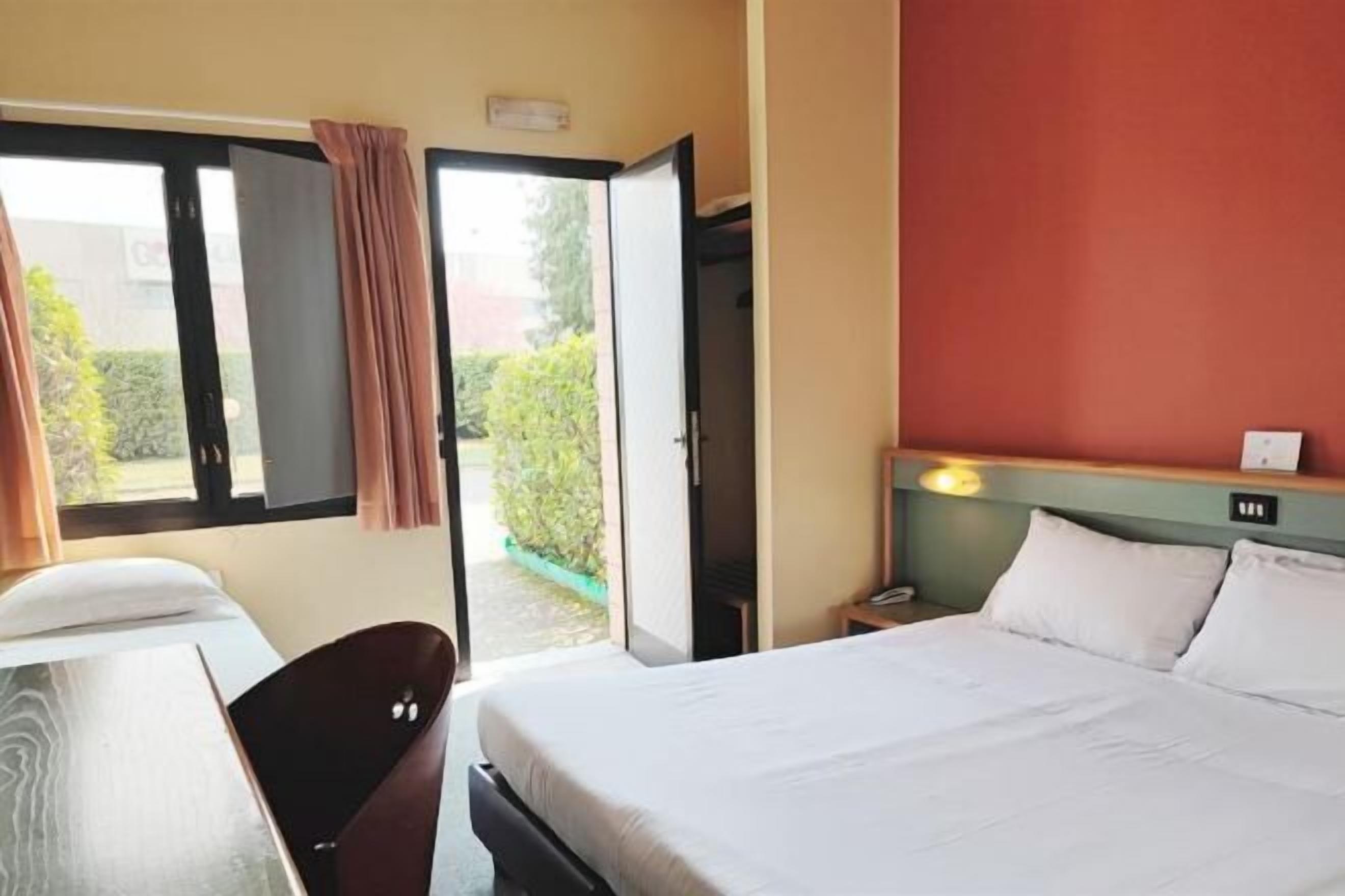 Premium bedding, down comforters, pillowtop beds, minibar