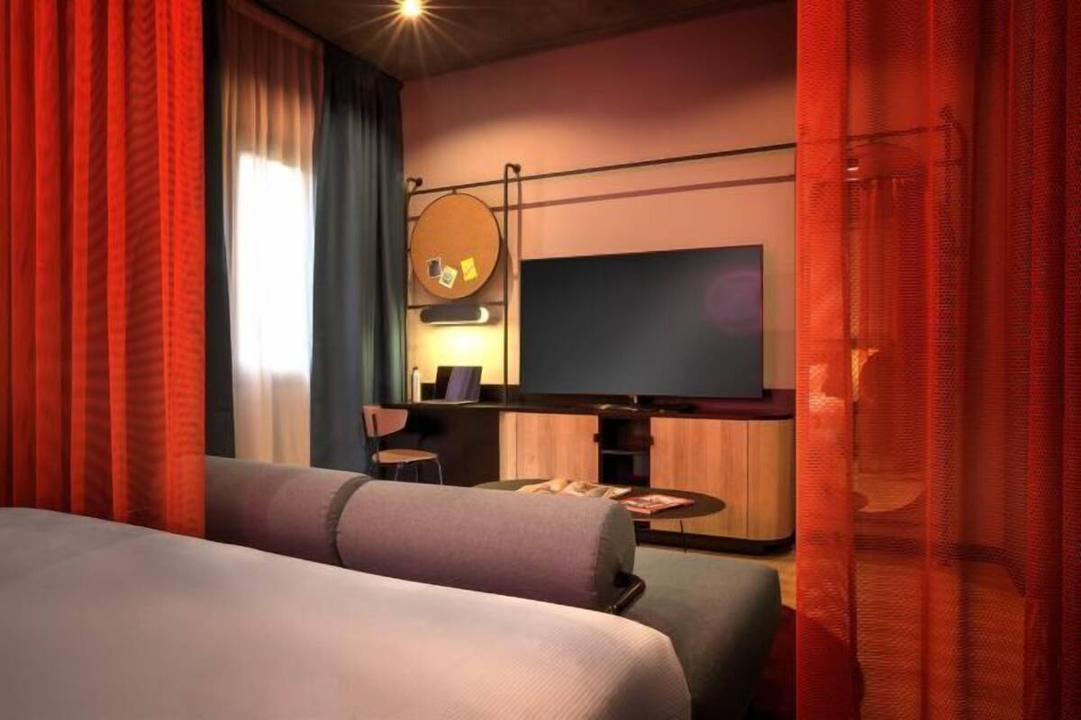 Premium bedding, down comforters, pillowtop beds, minibar