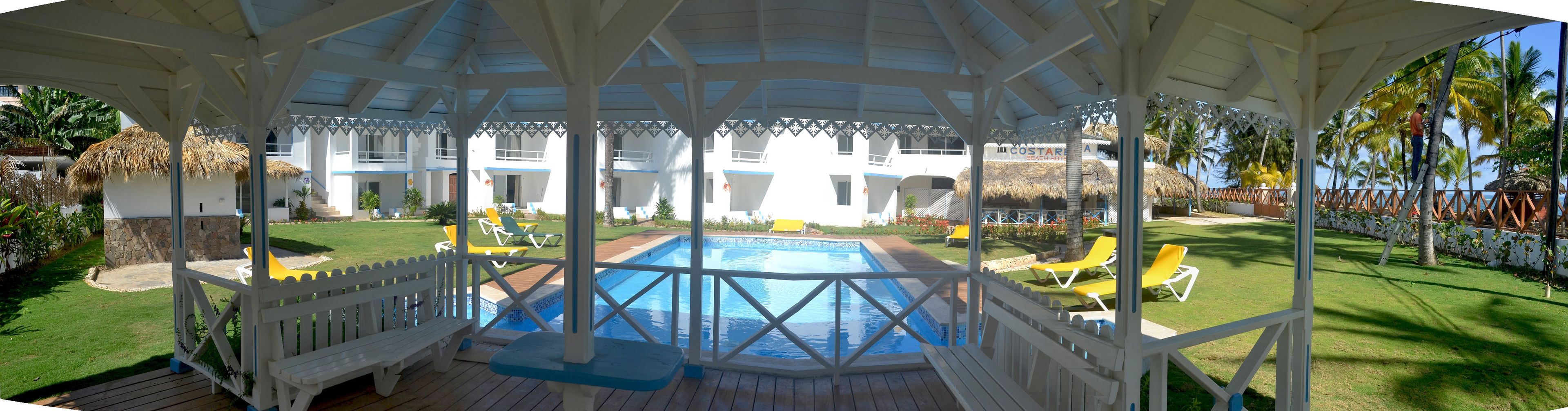 Outdoor pool, open 9:00 AM to 7:00 PM, pool umbrellas, sun loungers