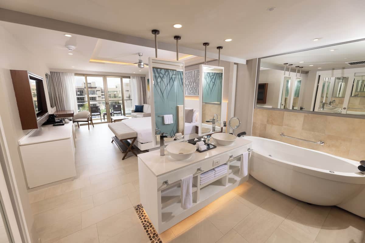 Separate tub and shower, jetted tub, rainfall showerhead