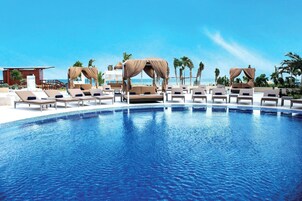 2 outdoor pools, pool umbrellas, pool loungers