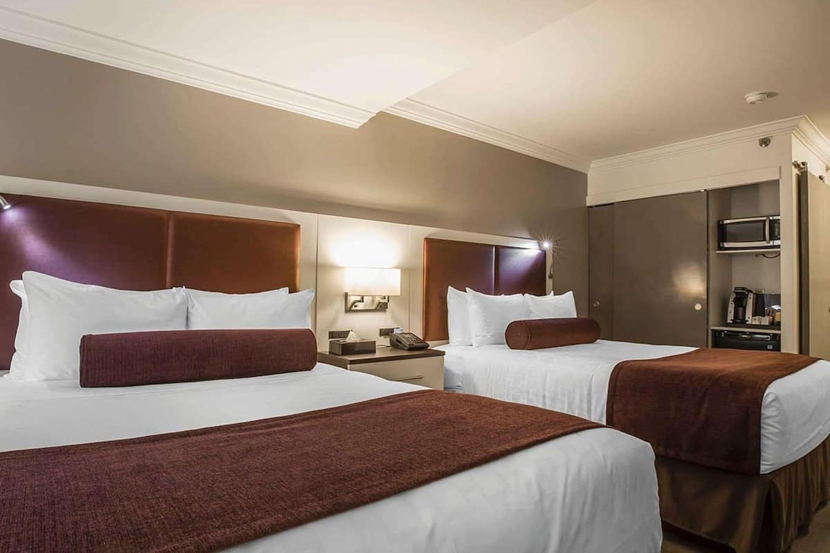 standard room, 2 queen beds, non smoking | hypo-allergenic bedding, pillow-top beds, in-room safe