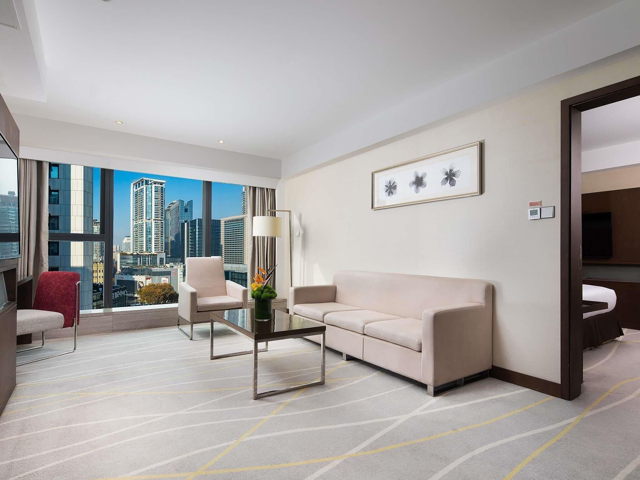 Suite, vista a la ciudad (1 double bed) | 1 habitación y ropa de cama de alta calidad 