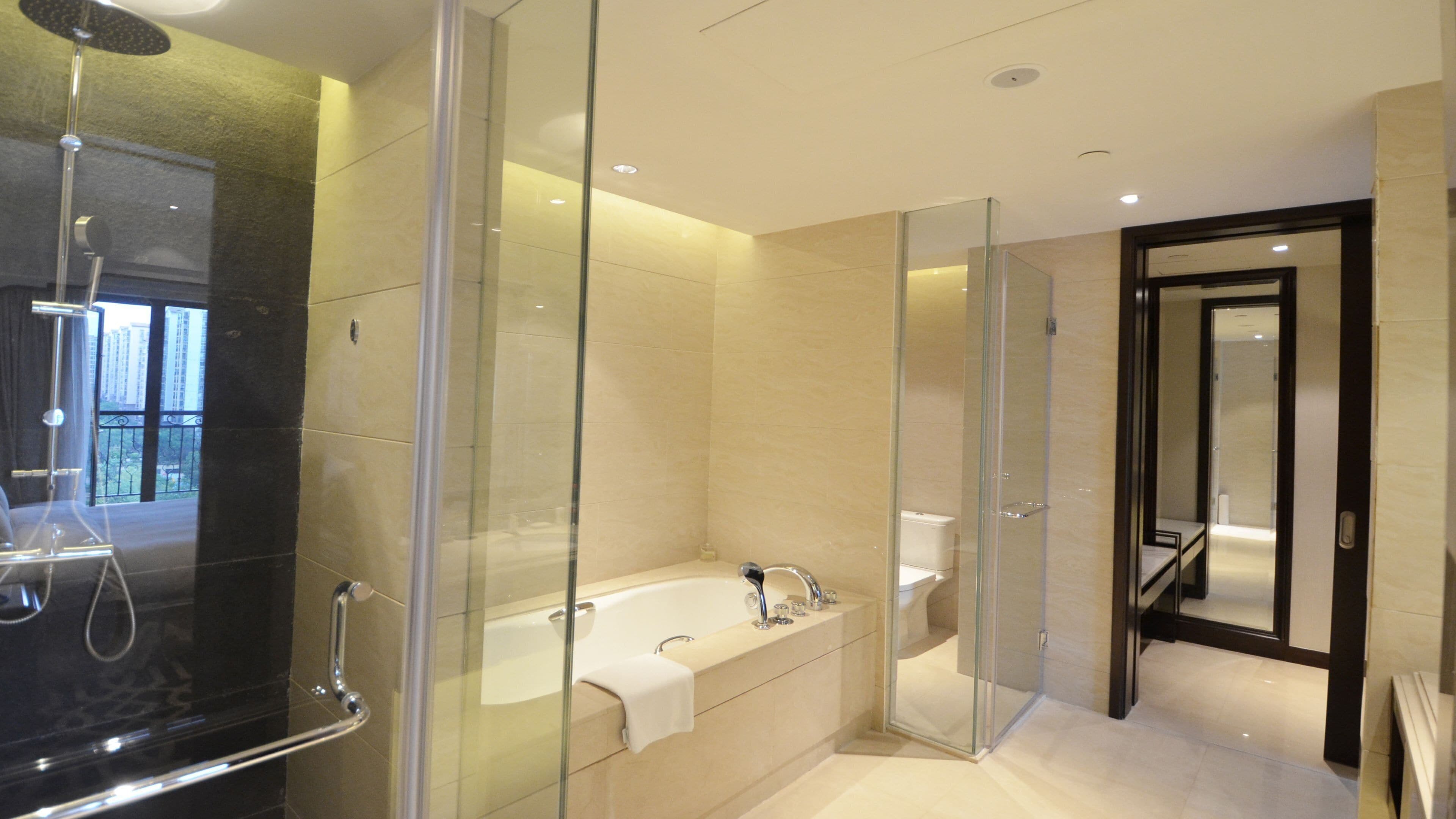 suite, 1 bedroom, balcony | bathroom | free toiletries, hair dryer, bathrobes, towels