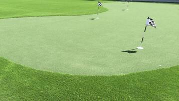 Enjoy a round of golf on our meticulously maintained course with lush, evenly cut grass and well-marked holes.