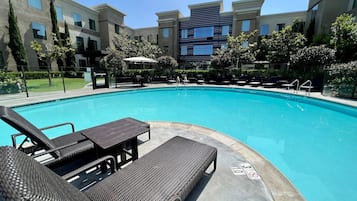 Outdoor pool, open 8:00 AM to 10:00 PM, sun loungers