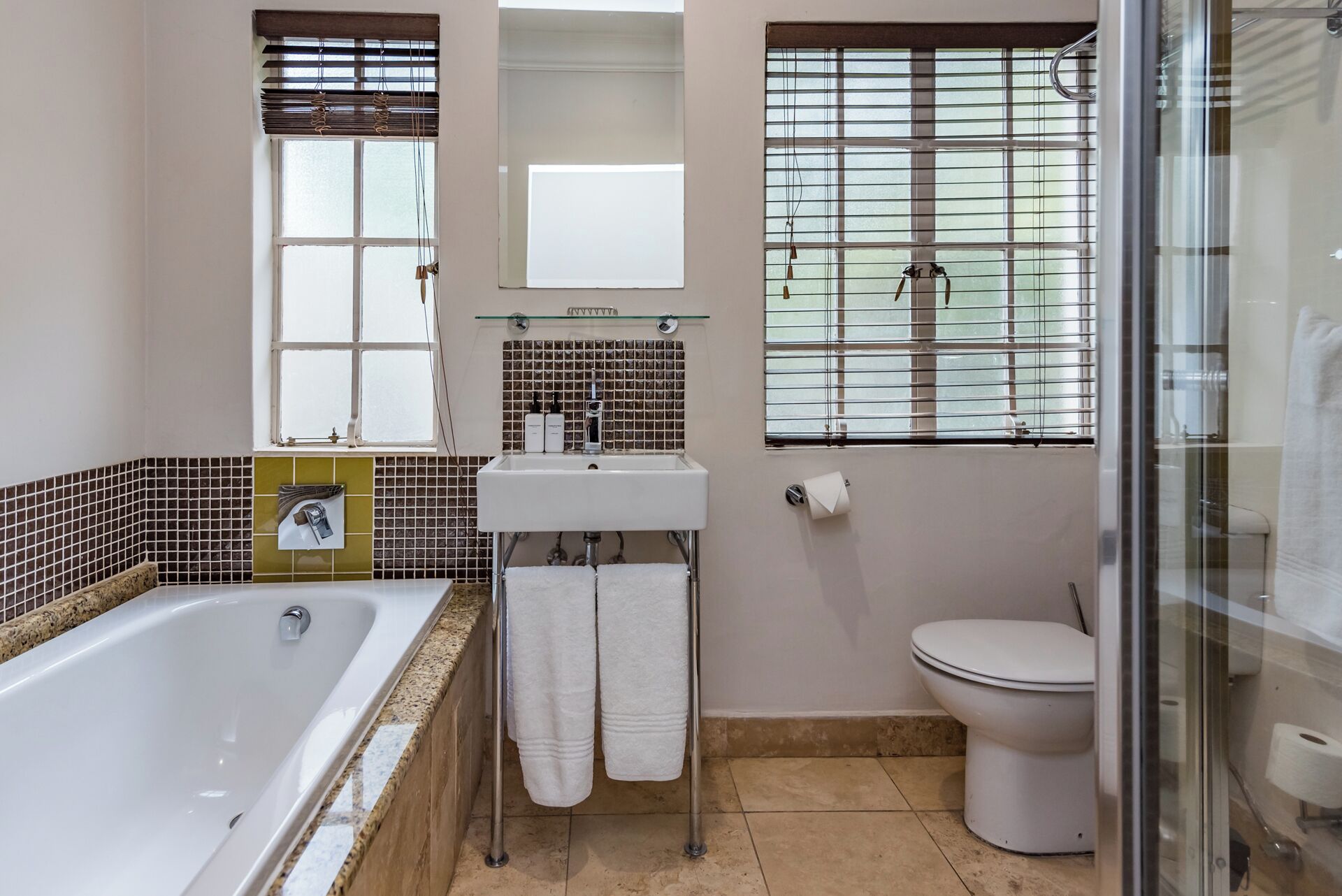 executive room, 1 king bed, non smoking, pool view | bathroom | slippers