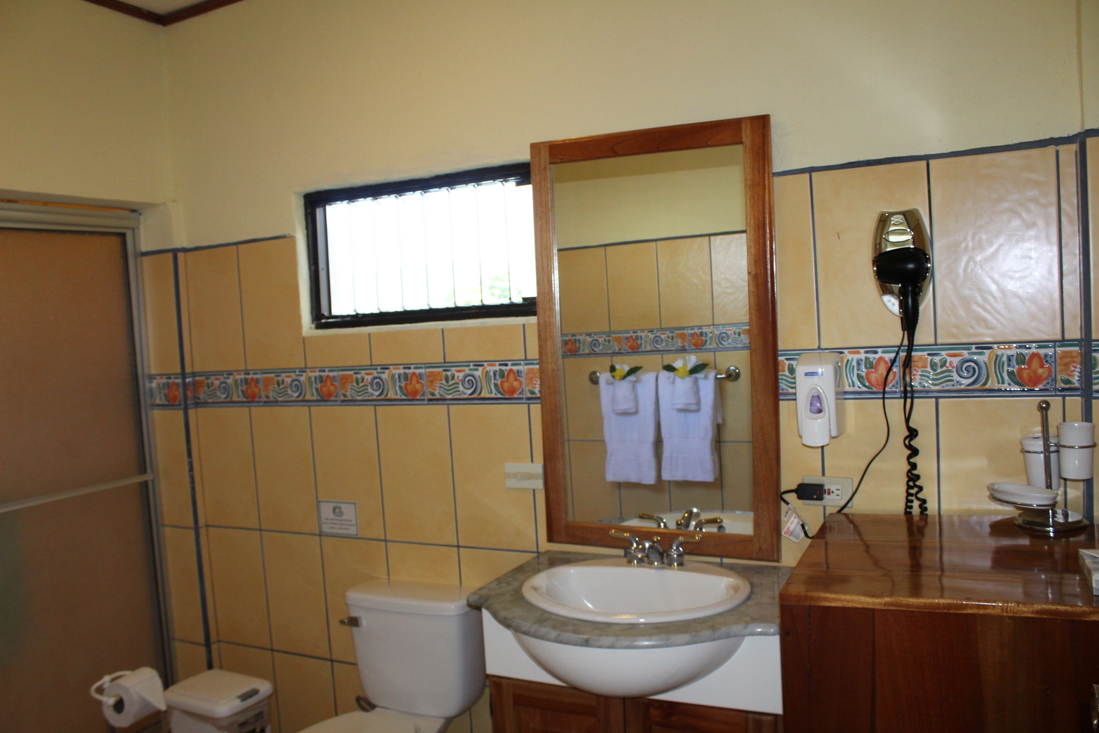 standard room, 2 double beds | bathroom | shower, towels