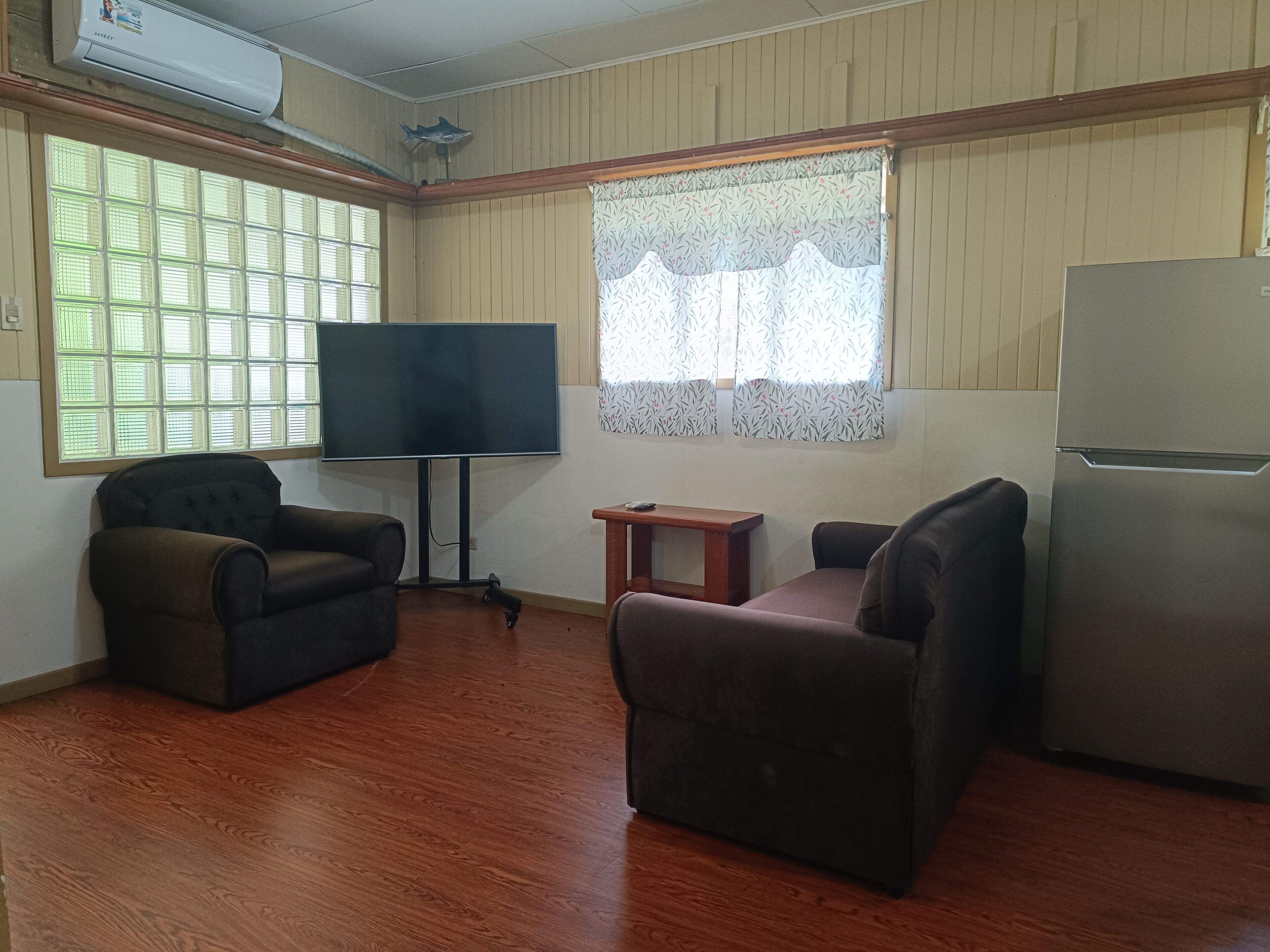 panoramic apartment | living area | plasma tv