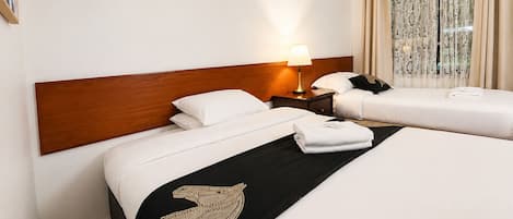 Standard Triple Room, 1 Bedroom | Hypo-allergenic bedding, desk, laptop workspace, iron/ironing board