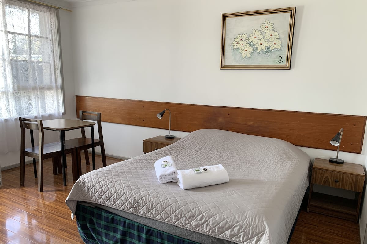Hypo-allergenic bedding, desk, laptop workspace, iron/ironing board