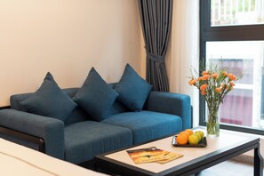 Family Triple Room, 1 Bedroom, City View | Living area | 32-inch LED TV with cable channels, TV, tablet - SQ HANG GAI HOTEL & SPA (Hanoi)